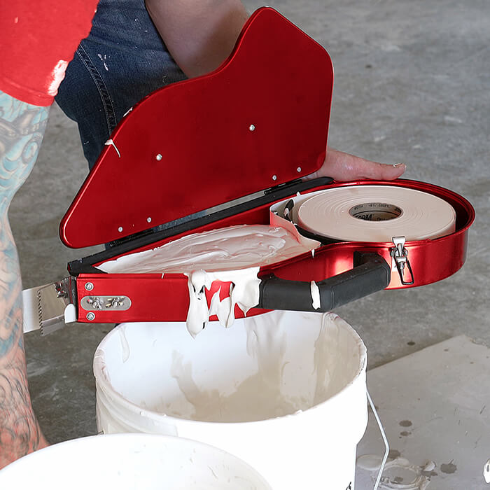 level5 drywall banjo being filled